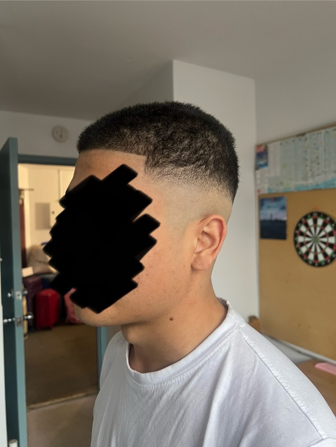 Fresh fade haircut, side view
